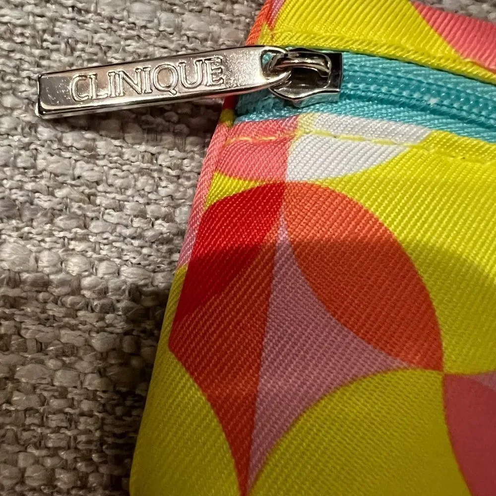 Clinique new condition yellow, red, and aqua cosmetics bag